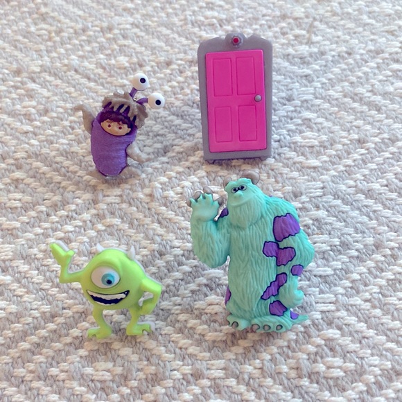 Disney Jewelry - Disney monsters Inc boo Mike wasowski earrings set of 2
